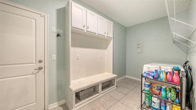 5910 Hevena Ct, Palmetto, FL 34221 - mudroom featuring light tile patterned floors and baseboards