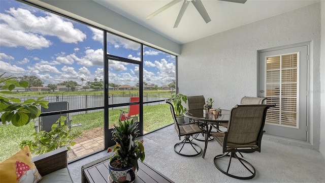 5910 Hevena Ct, Palmetto, FL 34221 - sunroom featuring a water view, ceiling fan, and outdoor dining area
