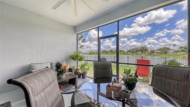 5910 Hevena Ct, Palmetto, FL 34221 - sunroom with a water view, plenty of natural light, and ceiling fan