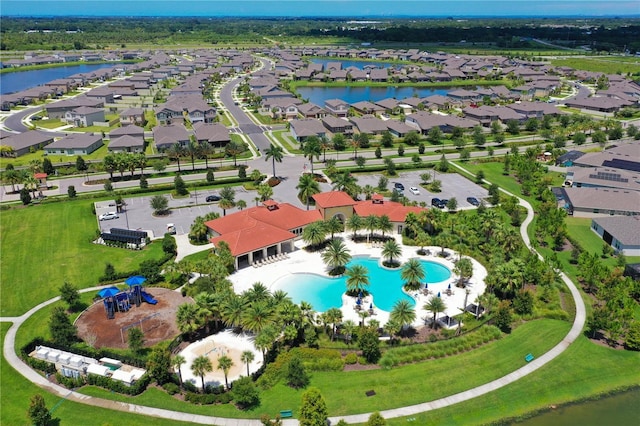 5910 Hevena Ct, Palmetto, FL 34221 - aerial view of residential area with a nearby body of water and a pool