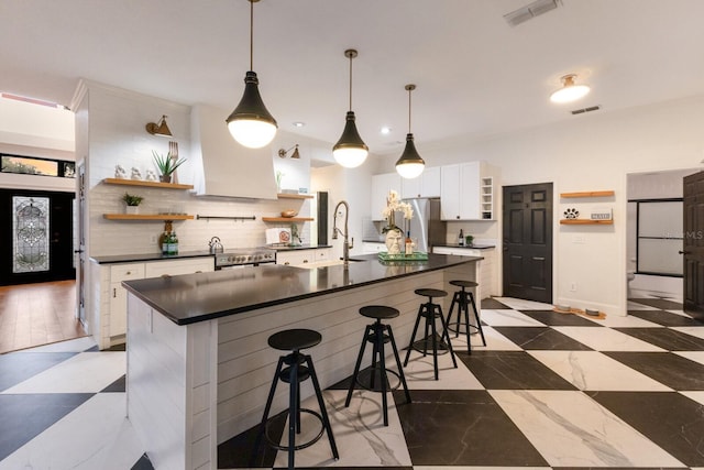9122 16th Avenue Cir NW, Bradenton, FL 34209 - kitchen featuring open shelves, dark countertops, stainless steel appliances, and decorative backsplash