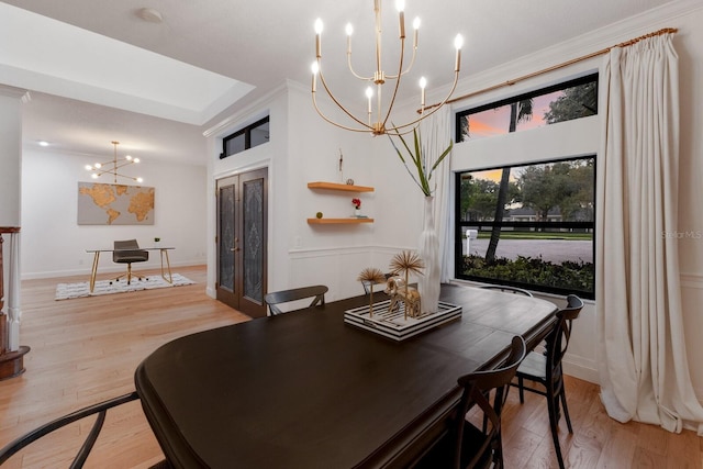 9122 16th Avenue Cir NW, Bradenton, FL 34209 - dining area featuring a chandelier and light wood-style floors