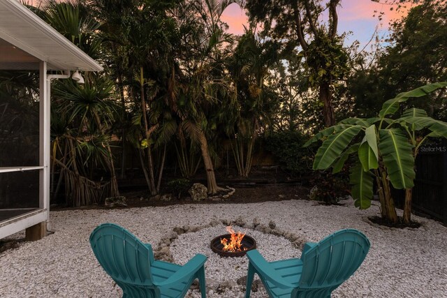 9122 16th Avenue Cir NW, Bradenton, FL 34209 - view of yard with a fire pit