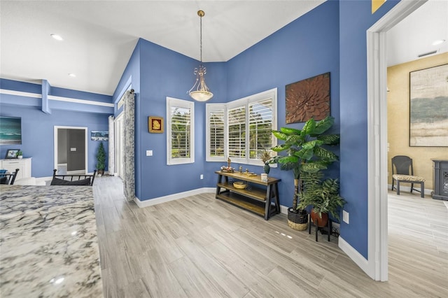 8924 Misty Creek Dr, Sarasota, FL 34241 - dining room featuring wood finished floors, recessed lighting, and beam ceiling