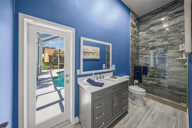8924 Misty Creek Dr, Sarasota, FL 34241 - full bathroom with vanity, a shower stall, and wood finished floors