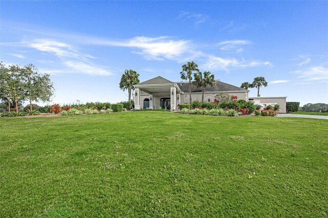 8924 Misty Creek Dr, Sarasota, FL 34241 - view of front facade featuring a front yard and driveway