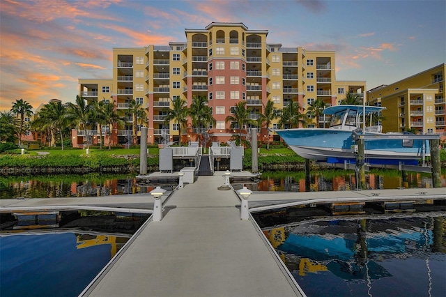 610 Riviera Dunes Way Unit 306, Palmetto, FL 34221 - view of swimming pool featuring a water view and a boat dock