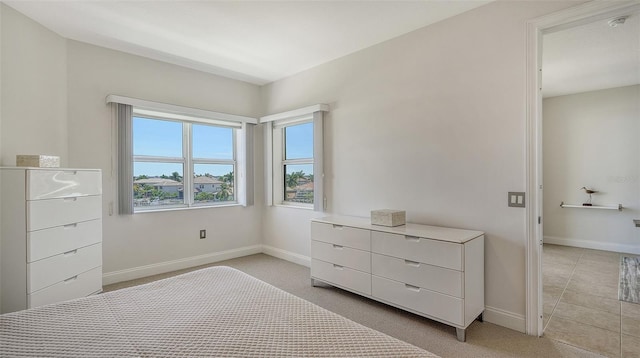 610 Riviera Dunes Way Unit 306, Palmetto, FL 34221 - bedroom featuring light carpet