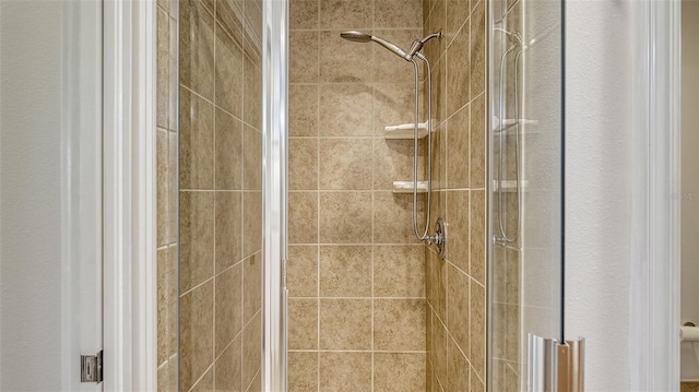 610 Riviera Dunes Way Unit 306, Palmetto, FL 34221 - bathroom featuring a stall shower