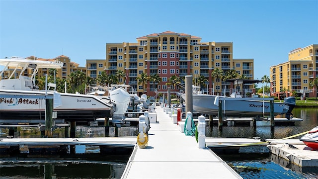 610 Riviera Dunes Way Unit 306, Palmetto, FL 34221 - dock featuring boat lift and a water view