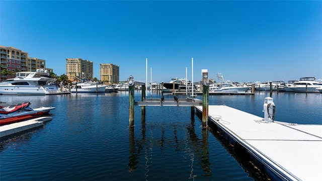 610 Riviera Dunes Way Unit 306, Palmetto, FL 34221 - dock area featuring a water view and boat lift
