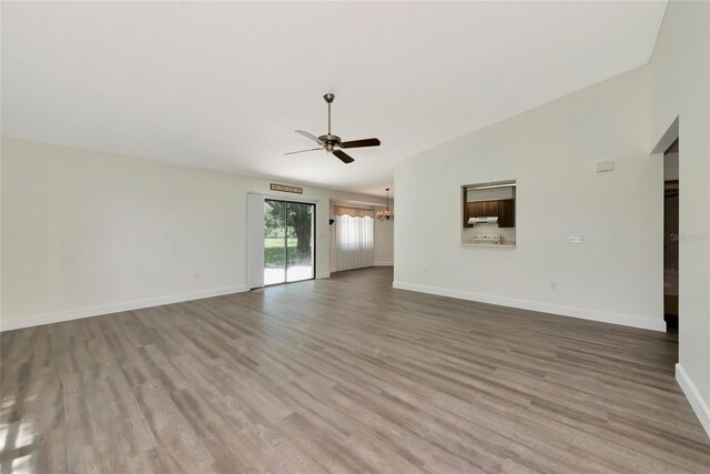 26147 L And J Rd, Myakka City, FL 34251 - unfurnished living room with ceiling fan and wood finished floors