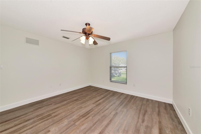 26147 L And J Rd, Myakka City, FL 34251 - spare room featuring a ceiling fan and wood finished floors