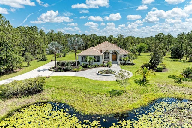 20207 71st Ave E, Bradenton, FL 34211 - view of front of property with a front yard and a water view