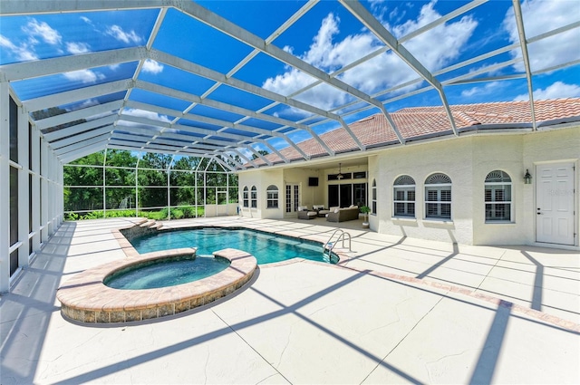 20207 71st Ave E, Bradenton, FL 34211 - view of swimming pool featuring a patio area, a pool with connected hot tub, and a lanai