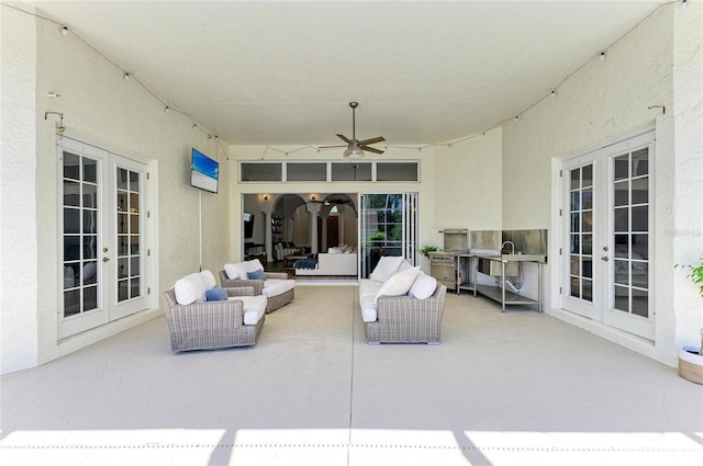 20207 71st Ave E, Bradenton, FL 34211 - view of patio featuring french doors, ceiling fan, and an outdoor living space