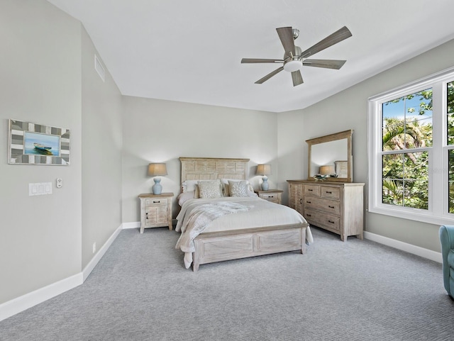 3959 Somerset Dr Unit 5, Sarasota, FL 34242 - carpeted bedroom with baseboards and ceiling fan