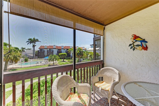 6840 Midnight Pass Rd Unit 6840, Sarasota, FL 34242 - view of sunroom / solarium