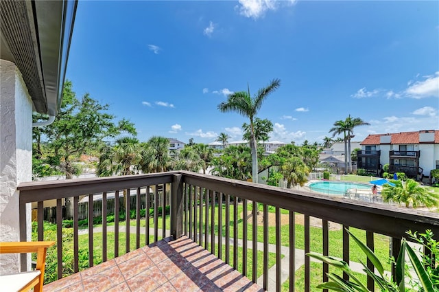 6840 Midnight Pass Rd Unit 6840, Sarasota, FL 34242 - wooden deck featuring a residential view and a yard
