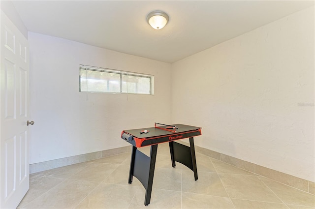 6840 Midnight Pass Rd Unit 6840, Sarasota, FL 34242 - recreation room with light tile patterned floors