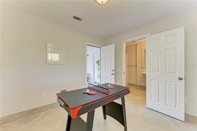 6840 Midnight Pass Rd Unit 6840, Sarasota, FL 34242 - playroom with light tile patterned floors