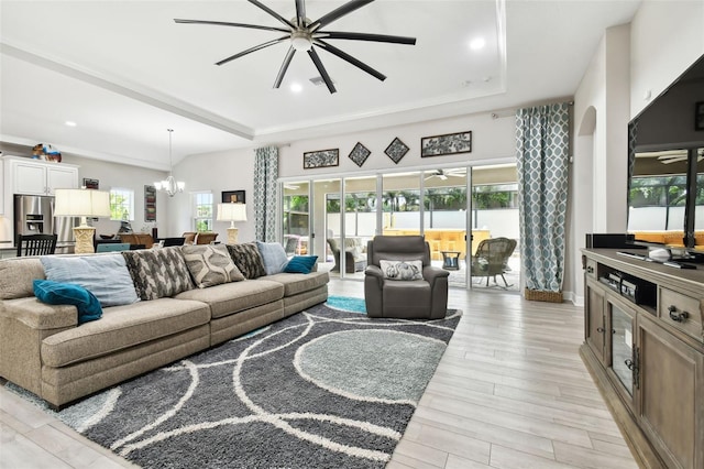 5802 Alabaster Stone Ln, Apollo Beach, FL 33572 - living area featuring a ceiling fan, a tray ceiling, plenty of natural light, and recessed lighting