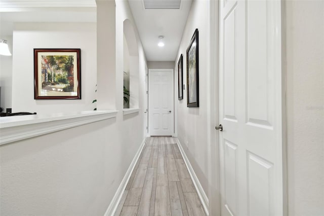 5802 Alabaster Stone Ln, Apollo Beach, FL 33572 - hallway with light wood finished floors and baseboards