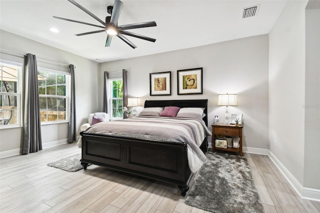 5802 Alabaster Stone Ln, Apollo Beach, FL 33572 - bedroom with light wood-style flooring, a ceiling fan, and recessed lighting