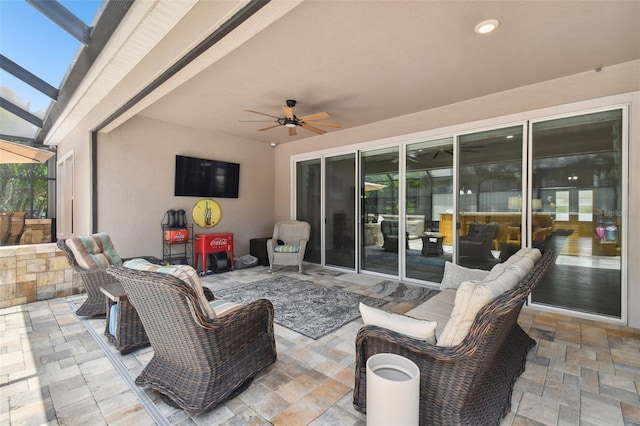 5802 Alabaster Stone Ln, Apollo Beach, FL 33572 - view of patio with a ceiling fan and glass enclosure