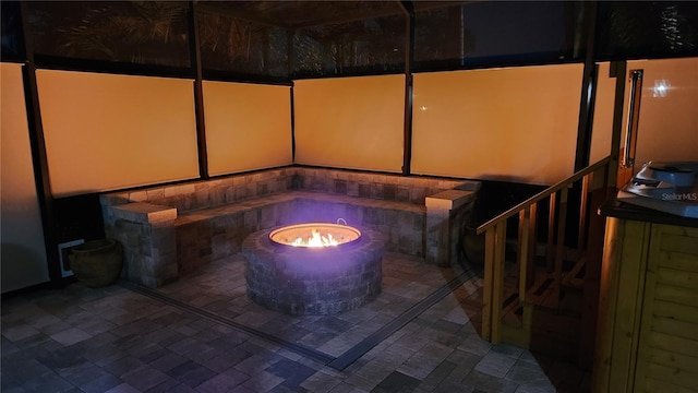 5802 Alabaster Stone Ln, Apollo Beach, FL 33572 - view of patio / terrace with an outdoor fire pit