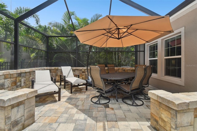 5802 Alabaster Stone Ln, Apollo Beach, FL 33572 - view of patio featuring a lanai and outdoor dining area