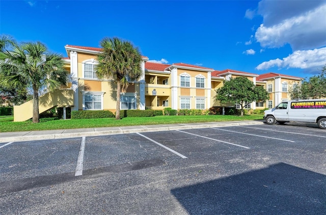 3005 Chianti Ct Unit 103, Sarasota, FL 34237 - view of property with uncovered parking