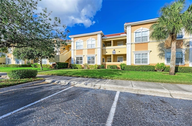 3005 Chianti Ct Unit 103, Sarasota, FL 34237 - view of property featuring uncovered parking