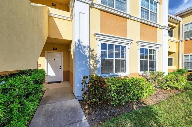 3005 Chianti Ct Unit 103, Sarasota, FL 34237 - property entrance with stucco siding