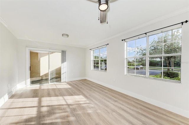 3005 Chianti Ct Unit 103, Sarasota, FL 34237 - unfurnished room with crown molding, light wood finished floors, and ceiling fan