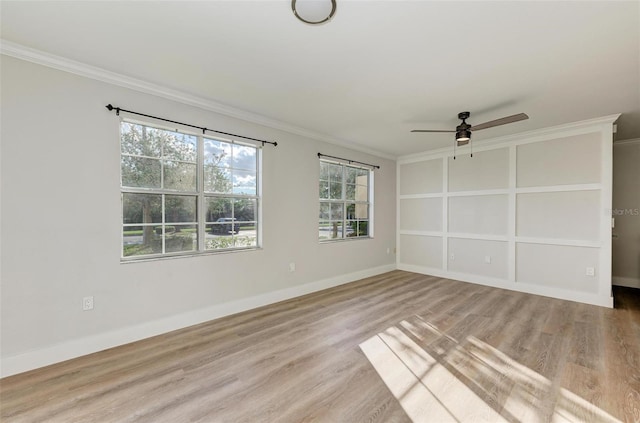 3005 Chianti Ct Unit 103, Sarasota, FL 34237 - spare room featuring crown molding, ceiling fan, and wood finished floors