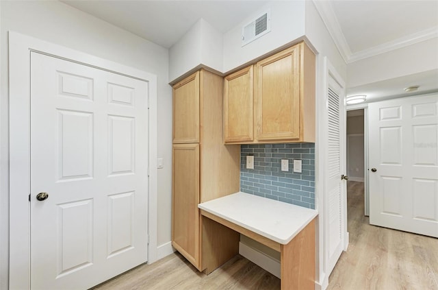 3005 Chianti Ct Unit 103, Sarasota, FL 34237 - mudroom with light wood-style floors and ornamental molding