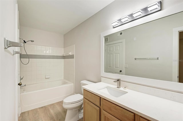 3005 Chianti Ct Unit 103, Sarasota, FL 34237 - bathroom with wood finished floors, vanity, and shower / bath combination