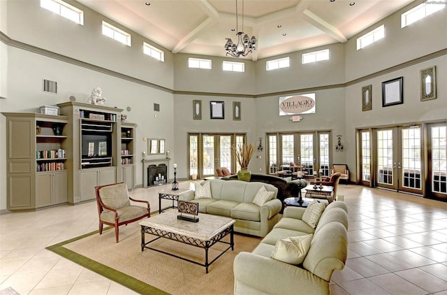 3005 Chianti Ct Unit 103, Sarasota, FL 34237 - living room featuring light tile patterned floors, a high ceiling, french doors, a chandelier, and beam ceiling