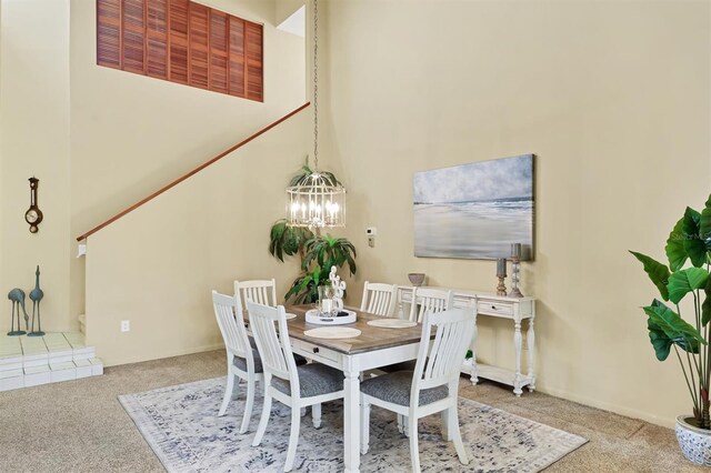 175 Inlets Blvd Unit 175, Nokomis, FL 34275 - carpeted dining area featuring a chandelier