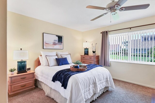 175 Inlets Blvd Unit 175, Nokomis, FL 34275 - bedroom featuring light carpet and ceiling fan