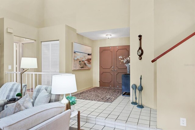 175 Inlets Blvd Unit 175, Nokomis, FL 34275 - entrance foyer with light tile patterned floors and baseboards