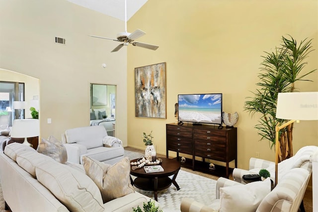 175 Inlets Blvd Unit 175, Nokomis, FL 34275 - living room featuring a ceiling fan and a towering ceiling