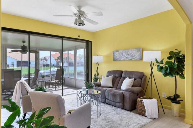 175 Inlets Blvd Unit 175, Nokomis, FL 34275 - living area with ceiling fan and wood finished floors