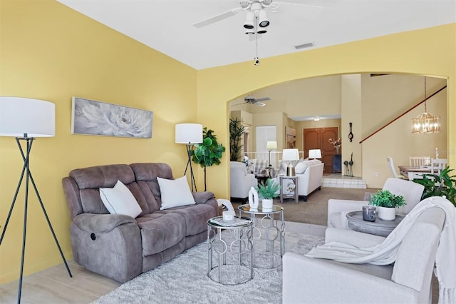175 Inlets Blvd Unit 175, Nokomis, FL 34275 - living room with ceiling fan, arched walkways, and a chandelier