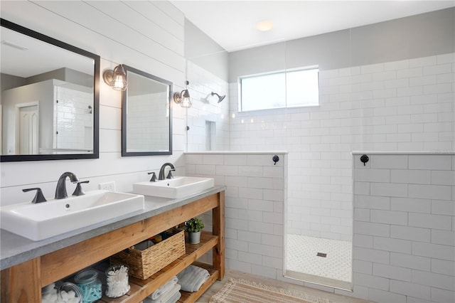 5419 Lakehurst Ct, Palmetto, FL 34221 - full bathroom featuring a walk in shower, double vanity, and tile walls