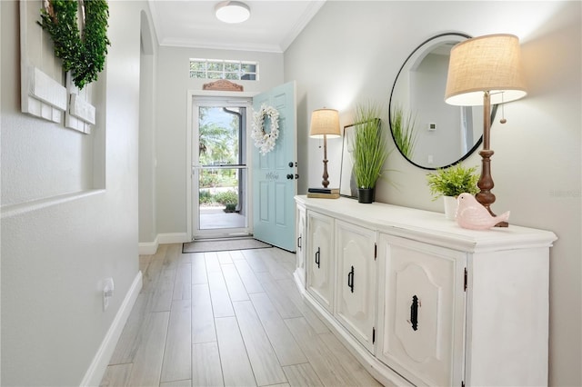 5419 Lakehurst Ct, Palmetto, FL 34221 - foyer featuring light wood-style floors and crown molding