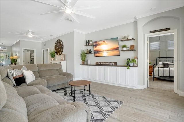 5419 Lakehurst Ct, Palmetto, FL 34221 - living room featuring a ceiling fan, light wood-type flooring, and ornamental molding