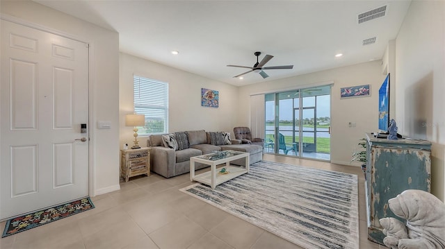 17817 Pastureland Ave, Lakewood Ranch, FL 34211 - living area with ceiling fan, light tile patterned flooring, and recessed lighting