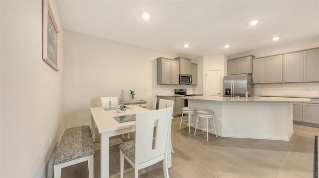 17817 Pastureland Ave, Lakewood Ranch, FL 34211 - dining room featuring light tile patterned floors and recessed lighting
